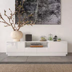Meuble TV moderne Famapy brillant avec tiroirs et bande lumineuse inférieure.