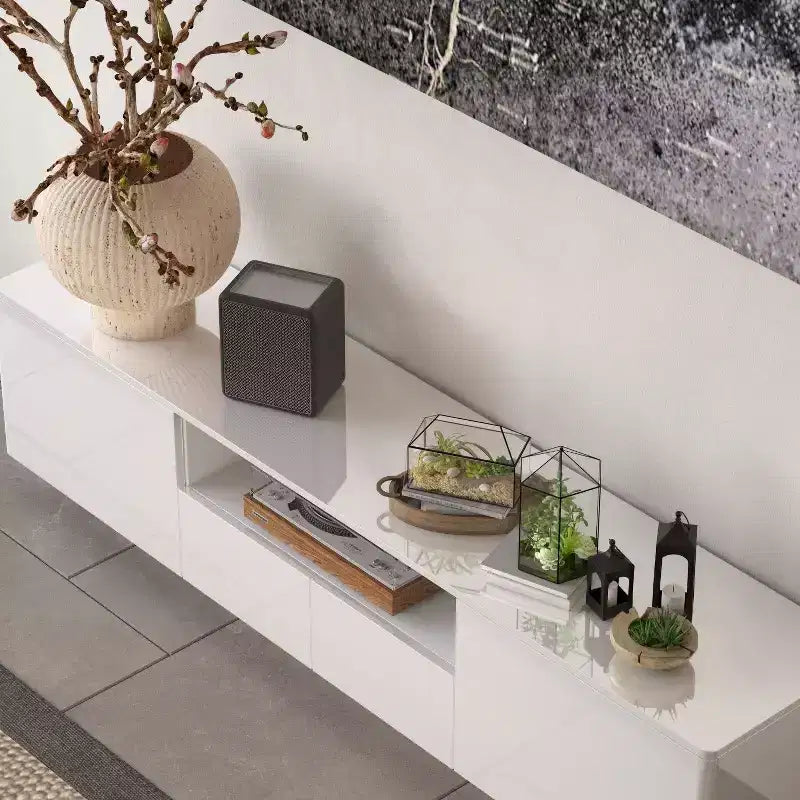 Meuble TV moderne Famapy brillant avec tiroirs et bande lumineuse inférieure.