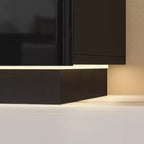 Meuble TV moderne Famapy brillant avec tiroirs et bande lumineuse inférieure.
