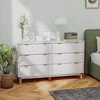 Commode double 6 tiroirs à façades cannelées, poignées dorées, cinq pieds en bois, blanche