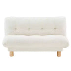Canapé Enfant Rembourré en Fausse Fourrure de Mouton Buzz & Bloom avec Assise et Dossier Capitonnés, Pieds en Bois Guimauve