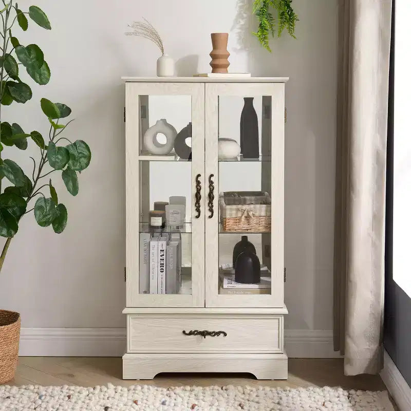 Meuble vitrine Okak, meuble de rangement avec 2 portes vitrées et 1 tiroir, meuble autoportant pour salon, couloir, bureau
