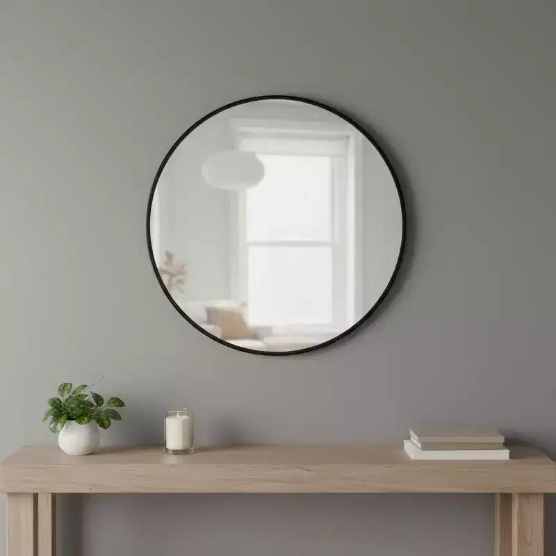 Miroir d'appoint rond HomeRoots 24 avec cadre noir