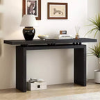 La console en placage de frêne, au design unique, présente un style moderne et minimaliste ainsi qu'un plateau astucieusement conçu, adapté