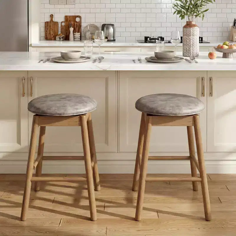 Lot de 2 tabourets de bar pivotants Costway 25" hauteur comptoir avec pieds en bois massif et repose-pieds