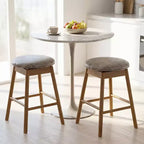 Lot de 2 tabourets de bar pivotants Costway 25" hauteur comptoir avec pieds en bois massif et repose-pieds