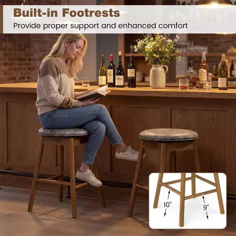 Lot de 2 tabourets de bar pivotants Costway 25" hauteur comptoir avec pieds en bois massif et repose-pieds