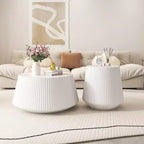 Table basse ronde en cuir avec plateau en pierre frittée et revêtement en cuir microfibre
