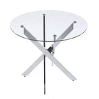 Table de salle à manger avec pieds croisés en métal et plateau en verre trempé, design moderne peu encombrant pour la cuisine ou le salon