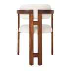 Chaise de salle à manger Storied Home en bois d'acacia avec tissu bouclé