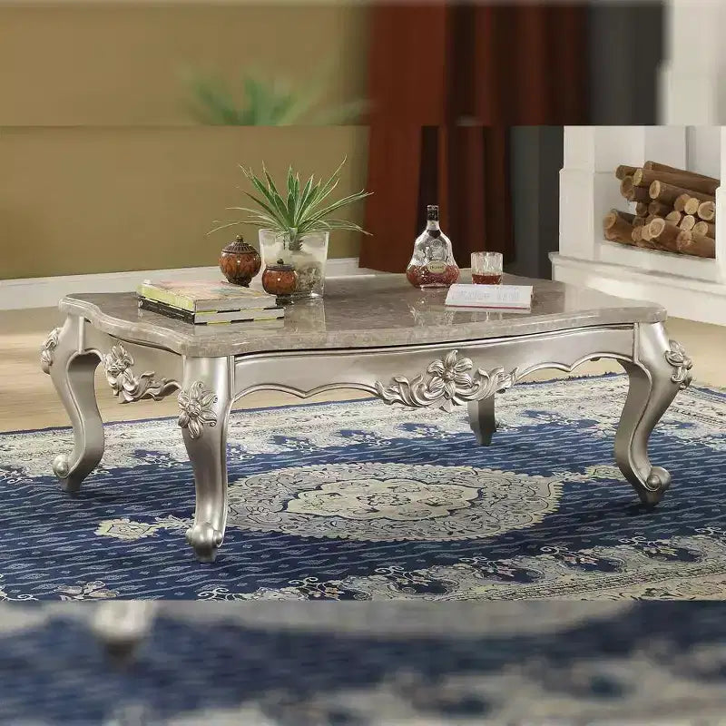 Table basse Bently 57" avec plateau en marbre et champagne - Acme Furniture