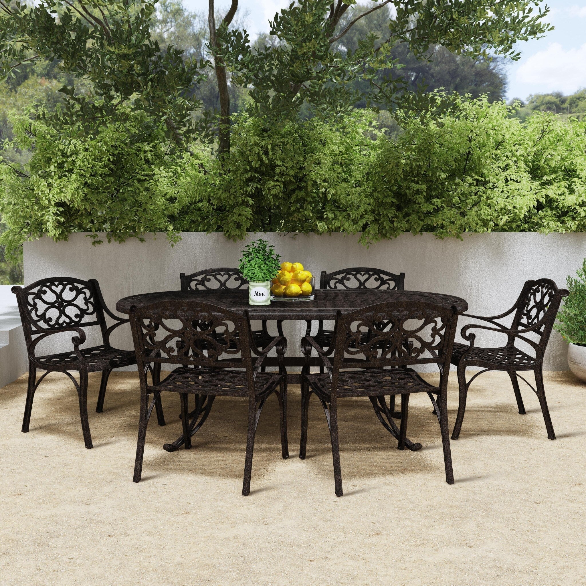 Ensemble de salle à manger d'extérieur 7 pièces en aluminium bronze Sanibel avec table à manger ovale de 72 et six fauteuils par Homestyles