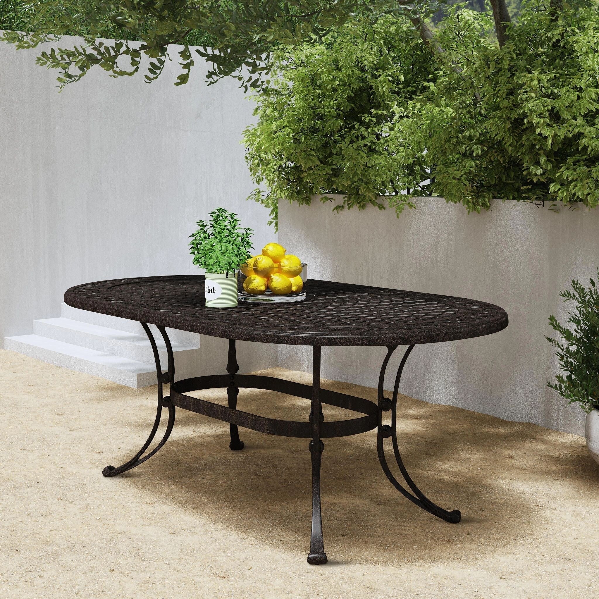Ensemble de salle à manger d'extérieur 7 pièces en aluminium bronze Sanibel avec table à manger ovale de 72 et six fauteuils par Homestyles