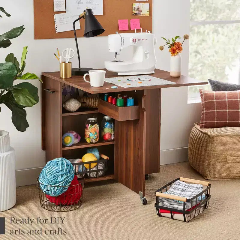 Table pliante polyvalente Best Choice Products avec roulettes, 3 étagères de rangement, casier, poignée