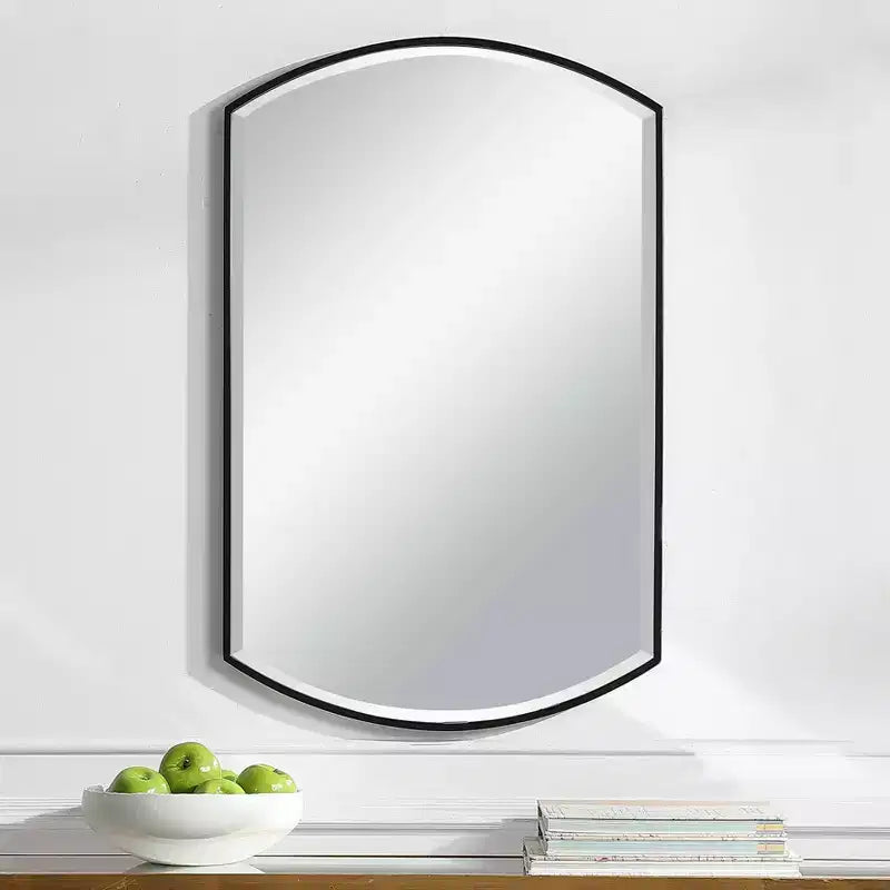 Miroir mural décoratif Uttermost Vanity avec cadre en fer noir satiné, biseauté et incurvé, de 61 cm de large, pour salle de bain, chambre à coucher ou salon