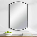 Miroir mural décoratif Uttermost Vanity avec cadre en fer noir satiné, biseauté et incurvé, de 61 cm de large, pour salle de bain, chambre à coucher ou salon
