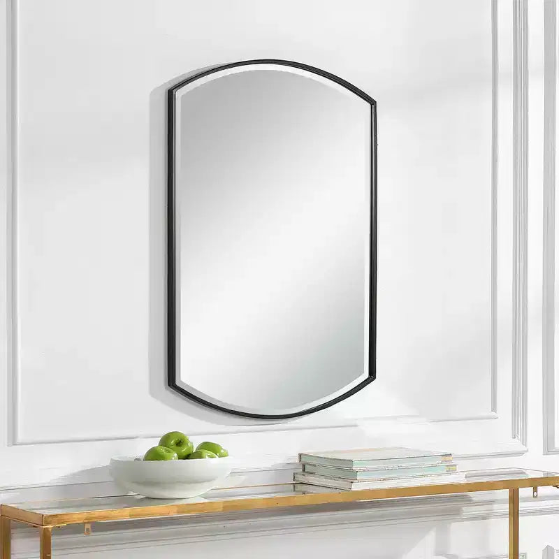 Miroir mural décoratif Uttermost Vanity avec cadre en fer noir satiné, biseauté et incurvé, de 61 cm de large, pour salle de bain, chambre à coucher ou salon