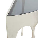 Console en aluminium Olivia & May avec pieds aux motifs fondus et plateau en verre fumé