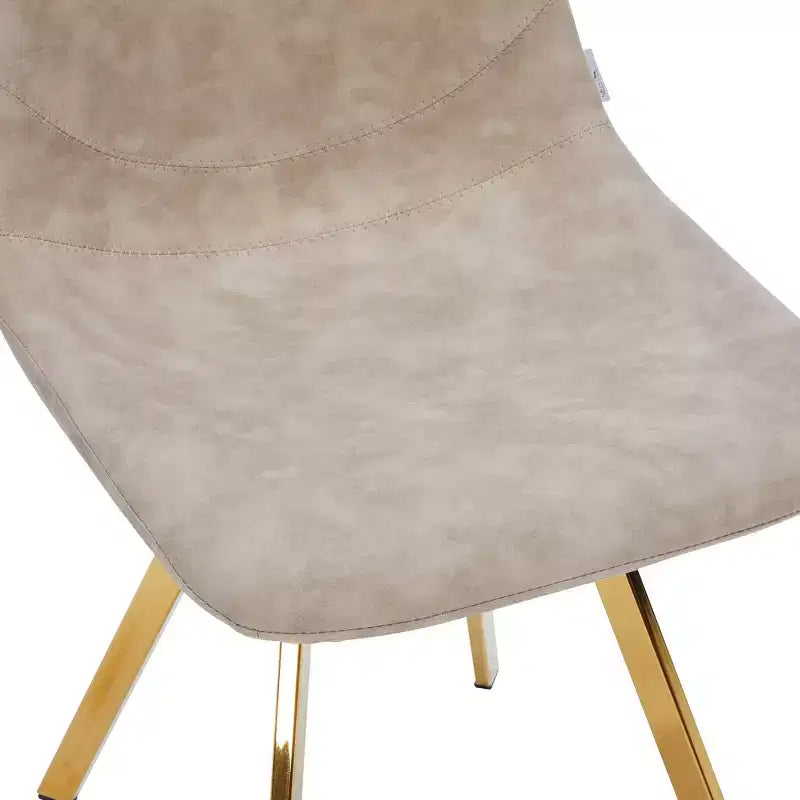 LeisureMod Markley - Lot de 4 chaises de salle à manger modernes en similicuir avec pieds dorés, assise rembourrée, design élégant pour cuisine, salle à manger, bureau ou café.