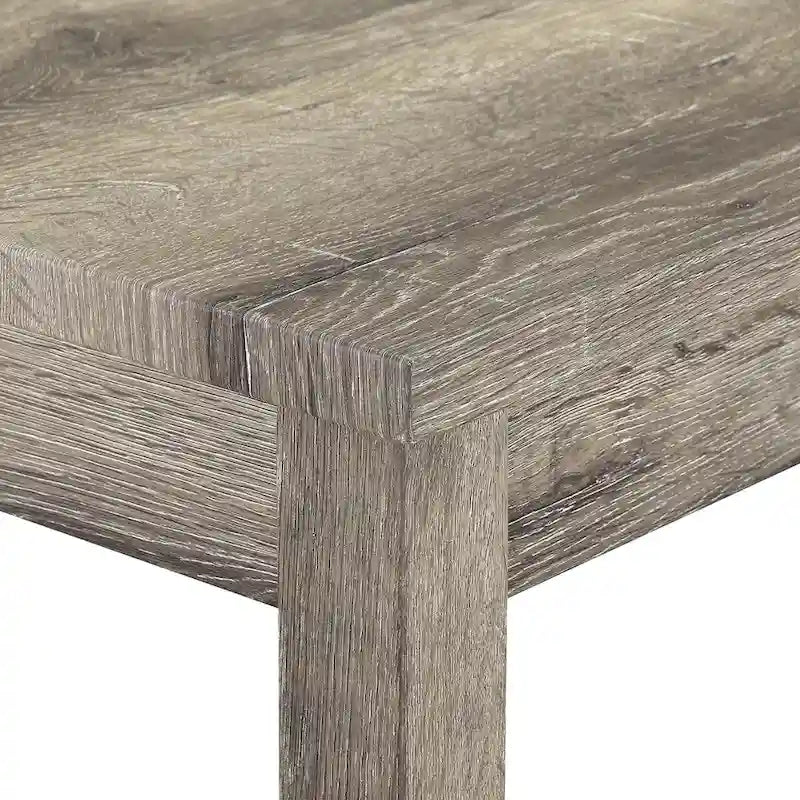 Table carrée en bois massif avec quatre chaises de salle à manger rembourrées