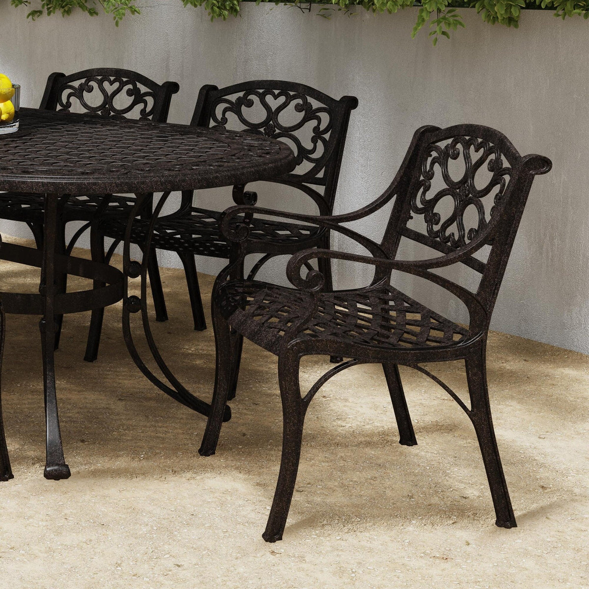 Ensemble de salle à manger d'extérieur 7 pièces en aluminium bronze Sanibel avec table à manger ovale de 72 et six fauteuils par Homestyles